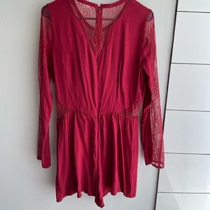Red lace short romper with pockets. Never worn.